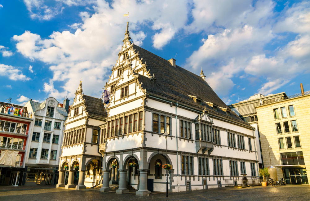 Grand victorian train station with clock tower paderborn